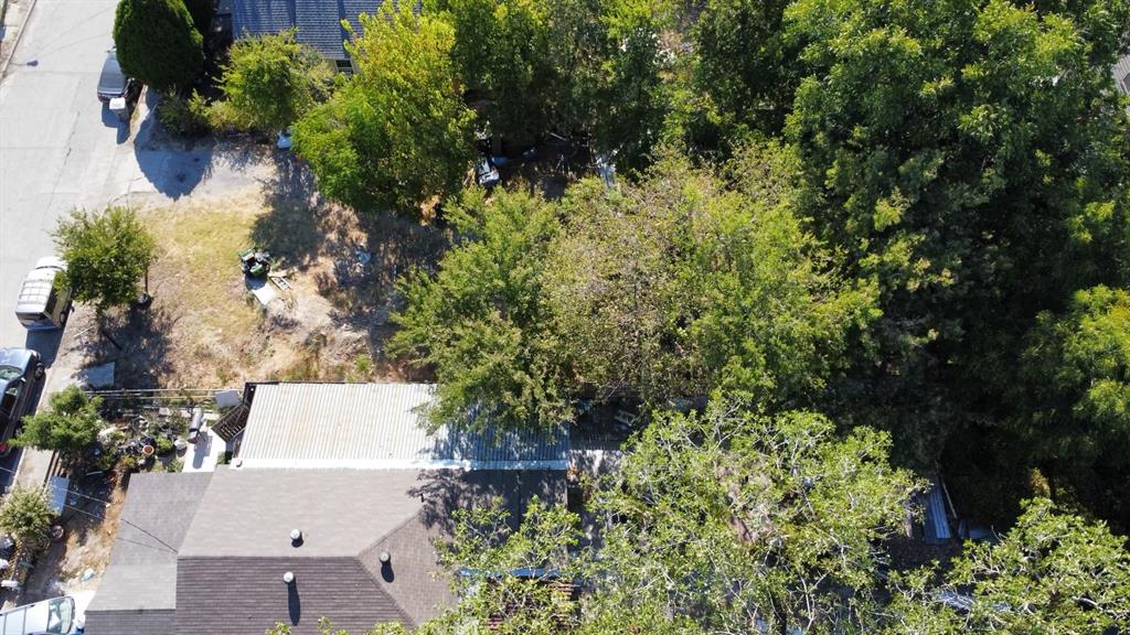 1333 Amos Street Dallas, TX 75212 - Photo 5 of 12 an aerial view of a house with a yard and garden