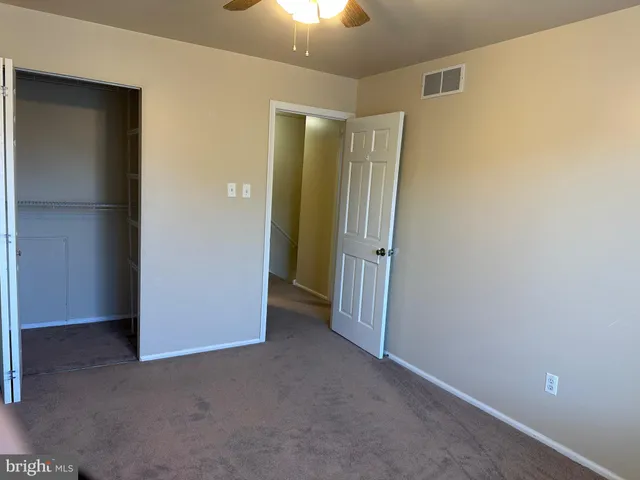 an empty room with a bathroom