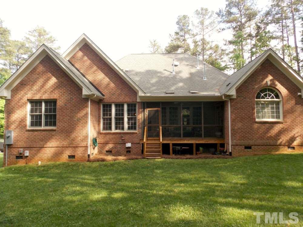 1840 Bowling Green Trail Raleigh, NC 27613 - Photo 14 of 16 a view of a house with a yard