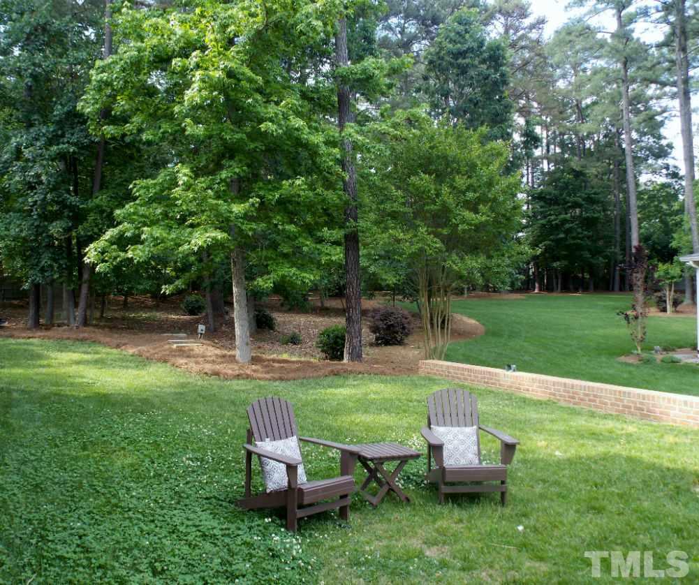 1840 Bowling Green Trail Raleigh, NC 27613 - Photo 15 of 16 a view of a yard with furniture