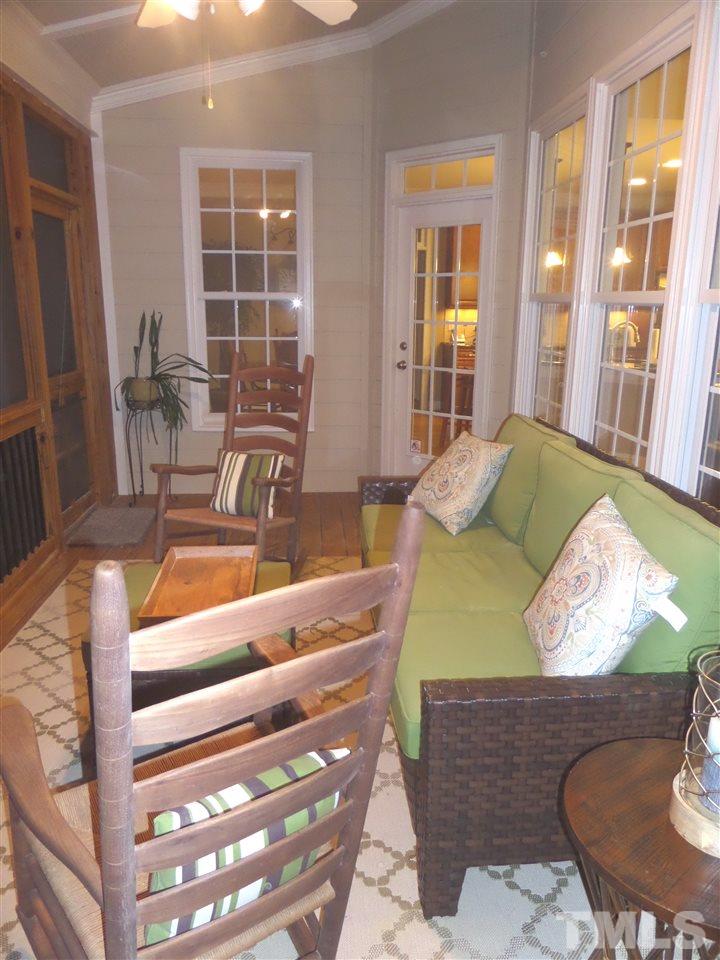 1840 Bowling Green Trail Raleigh, NC 27613 - Photo 6 of 16 a living room with furniture and a large window