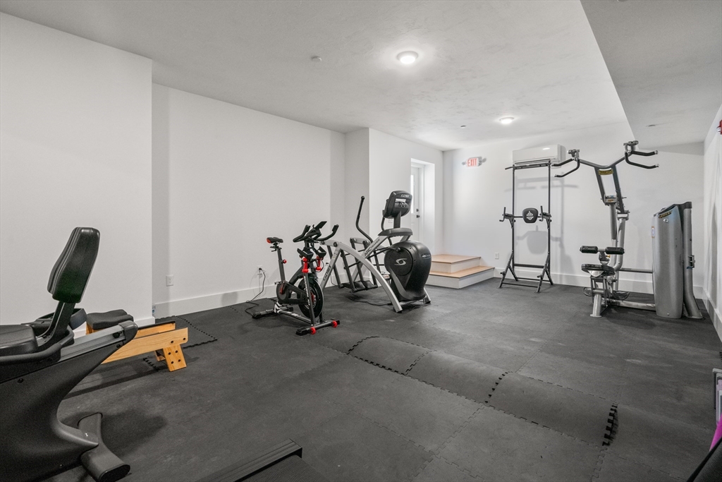 16 Everett Street, Unit 202 Boston, MA 02130 - Photo 14 of 19 a view of a room with gym equipment
