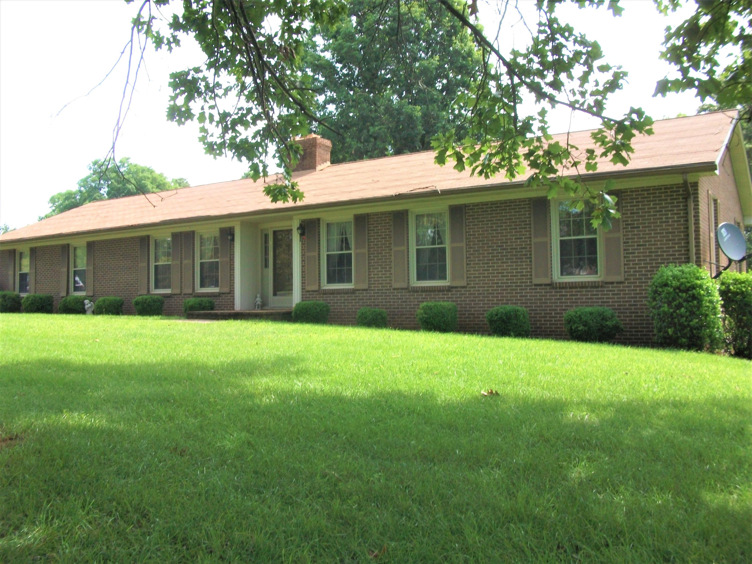 1958 Truevine Road Penhook, VA 24137 - Photo 1 of 45 a view of a house with a backyard