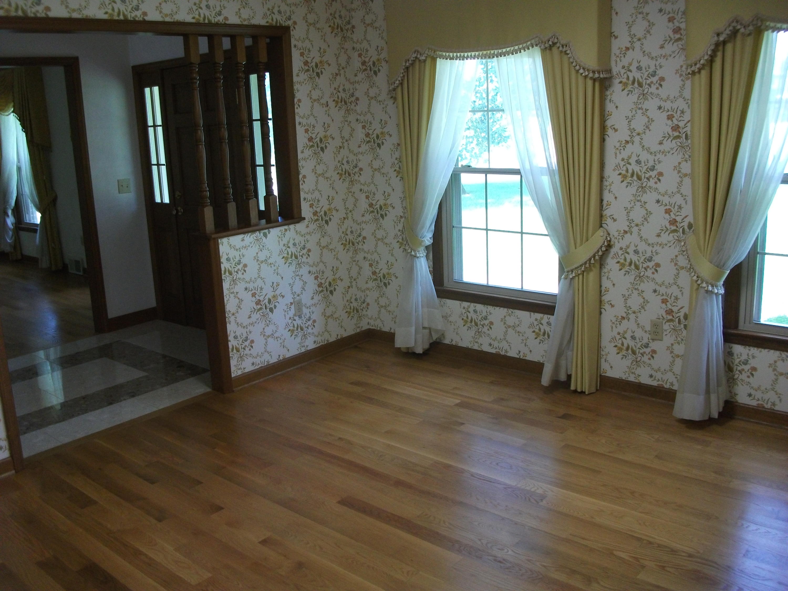 1958 Truevine Road Penhook, VA 24137 - Photo 13 of 45 an empty room with wooden floor and windows