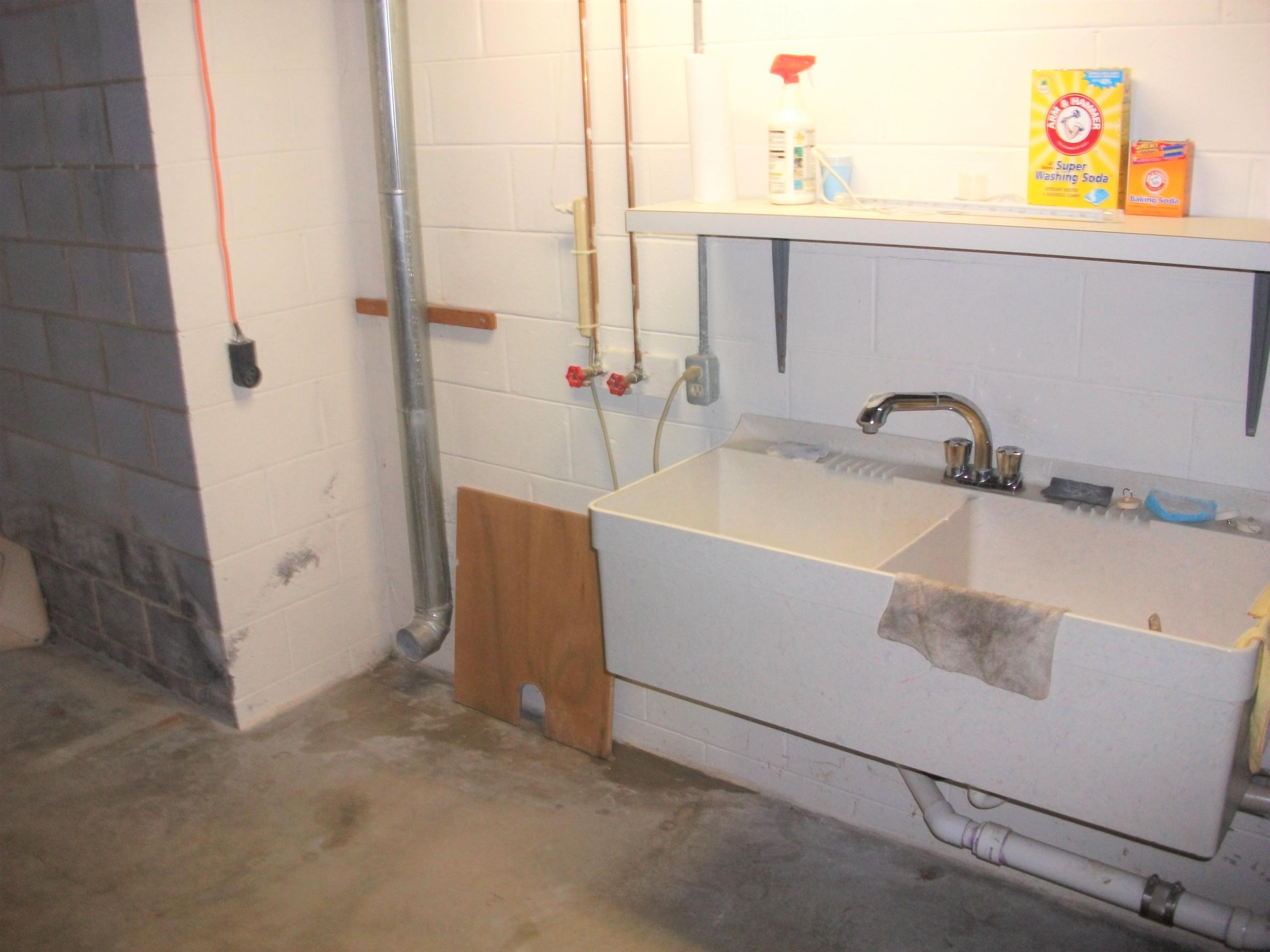 1958 Truevine Road Penhook, VA 24137 - Photo 28 of 45 a bathroom with a sink and a mirror
