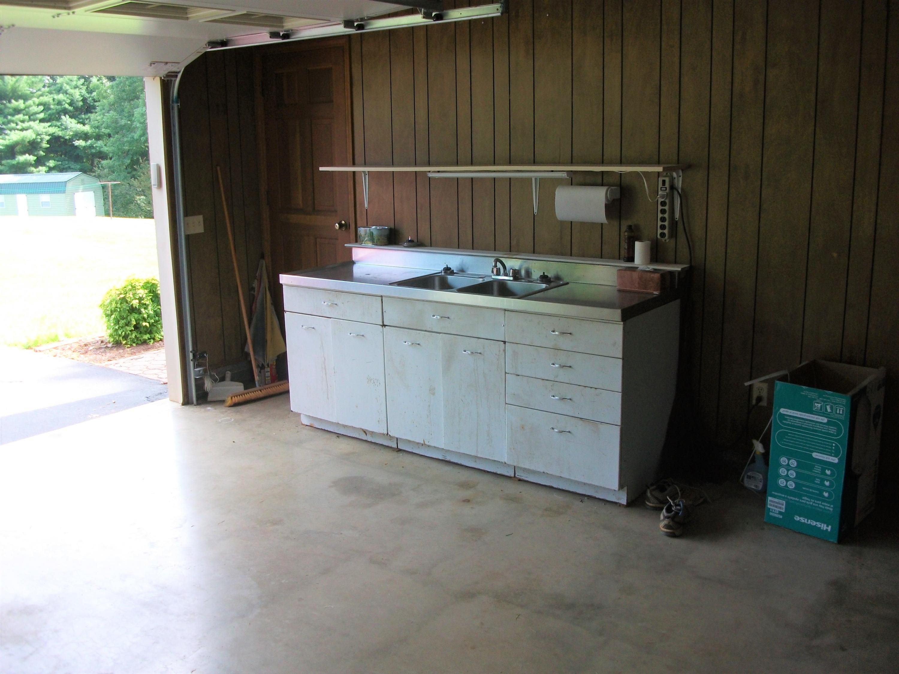 1958 Truevine Road Penhook, VA 24137 - Photo 34 of 45 a bathroom with a sink and a mirror