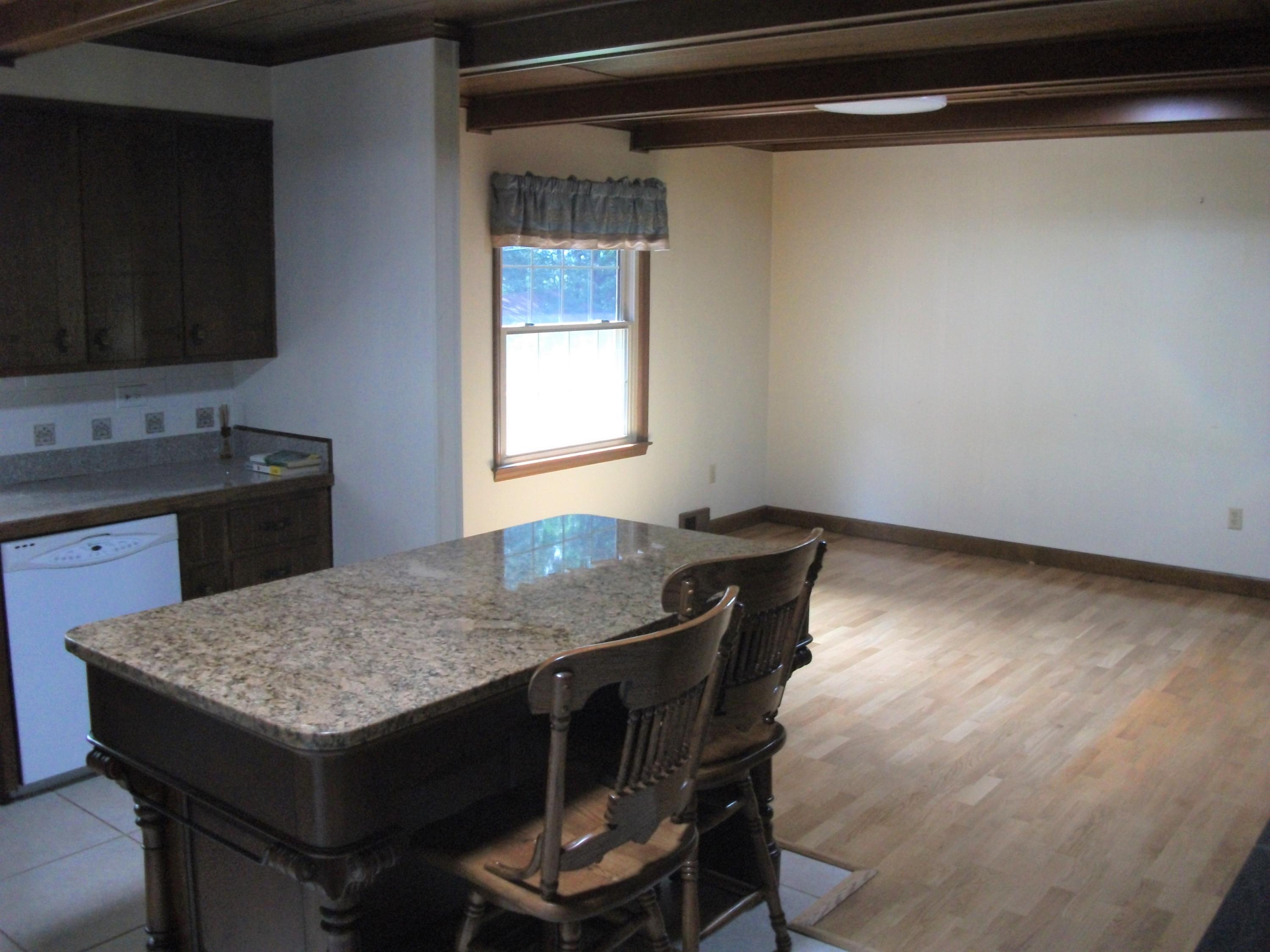 1958 Truevine Road Penhook, VA 24137 - Photo 8 of 45 a kitchen with a table and chairs in it