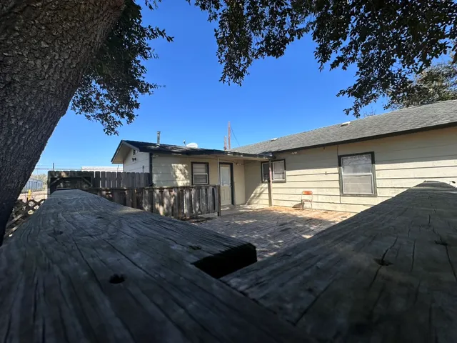 a view of a swimming pool and an outdoor space