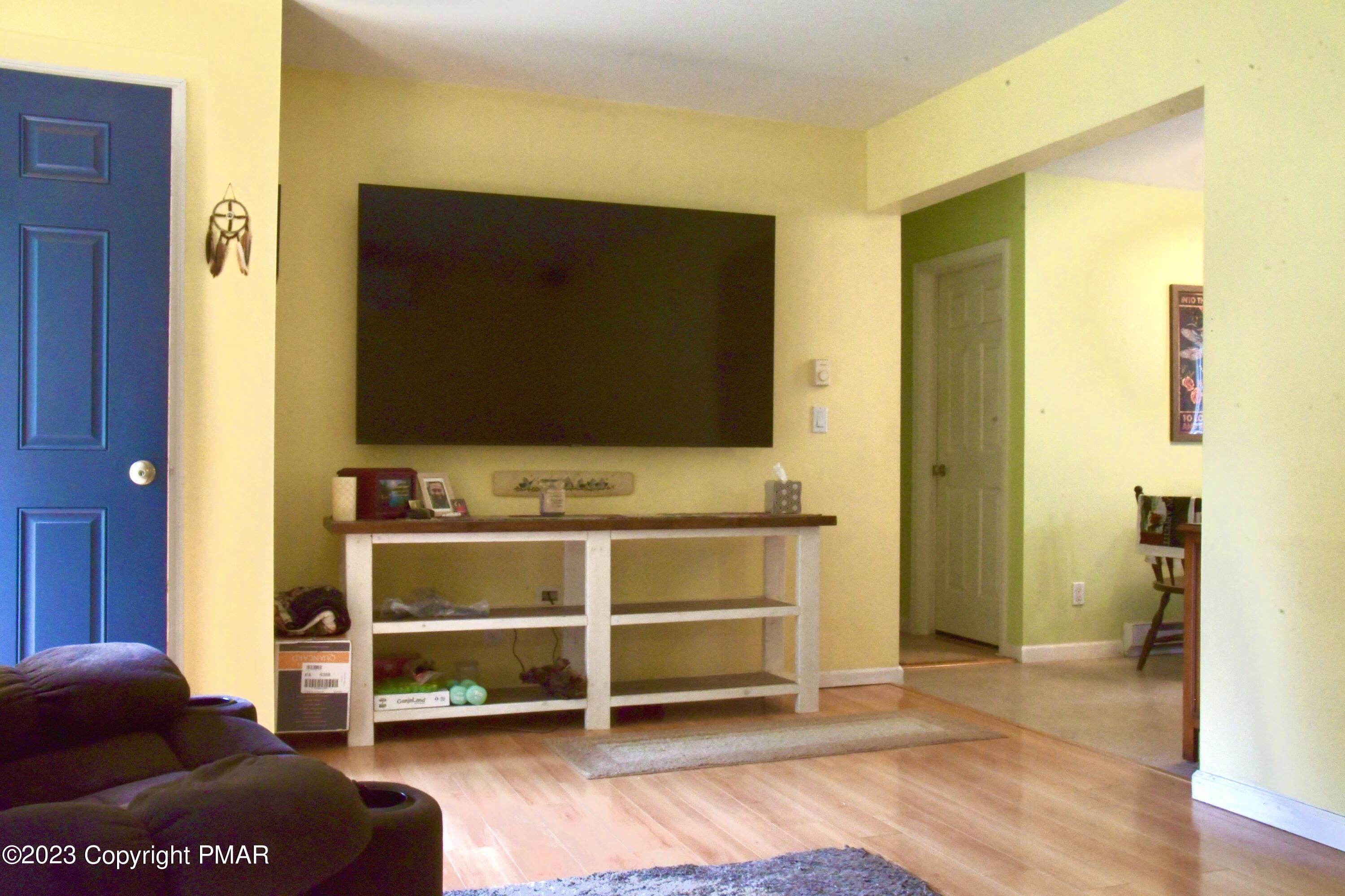 238 Schochs Mill Road Blakeslee, PA 18610 - Photo 6 of 13 a view of room with furniture and a flat screen tv