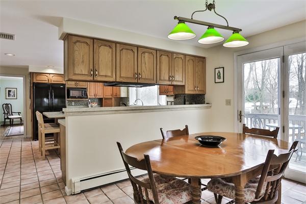35 Lorena Road Winchester, MA 01890 - Photo 15 of 29 a view of a dining room with furniture