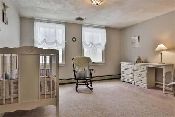 35 Lorena Road Winchester, MA 01890 - Photo 19 of 29 a room with furniture and a window