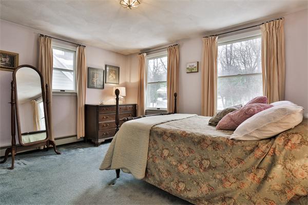 35 Lorena Road Winchester, MA 01890 - Photo 20 of 29 a bedroom with bed and window