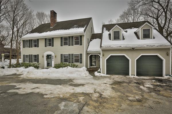 35 Lorena Road Winchester, MA 01890 - Photo 29 of 29 a front view of a house with a yard