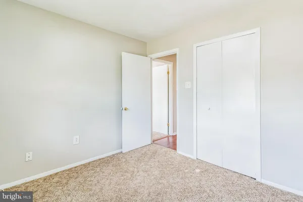 a view of hallway with livingroom