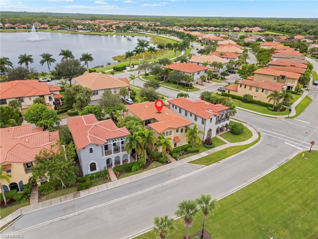1300 Kendari Terrace Naples, FL 34113 - Photo 24 of 31 an aerial view of residential houses with outdoor space and river