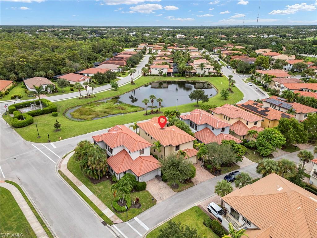 1300 Kendari Terrace Naples, FL 34113 - Photo 28 of 31 an aerial view of residential houses with outdoor space