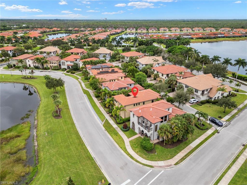 1300 Kendari Terrace Naples, FL 34113 - Photo 29 of 31 an aerial view of a city
