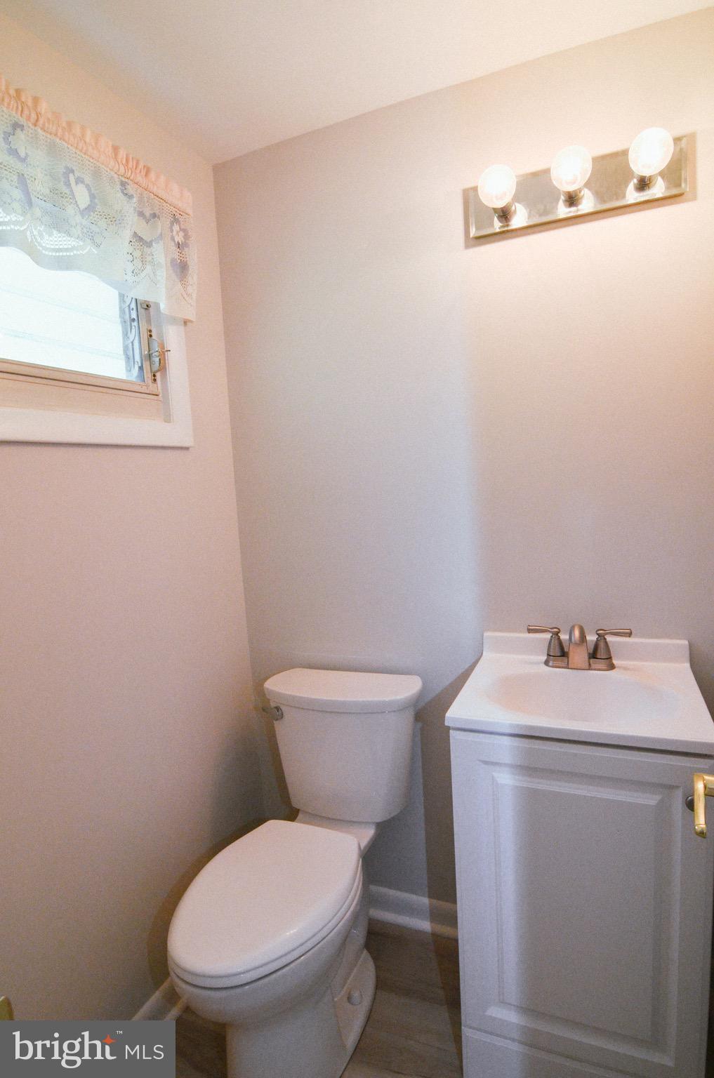 702 Glen Road Warminster, PA 18974 - Photo 27 of 38 half bathroom fam rm