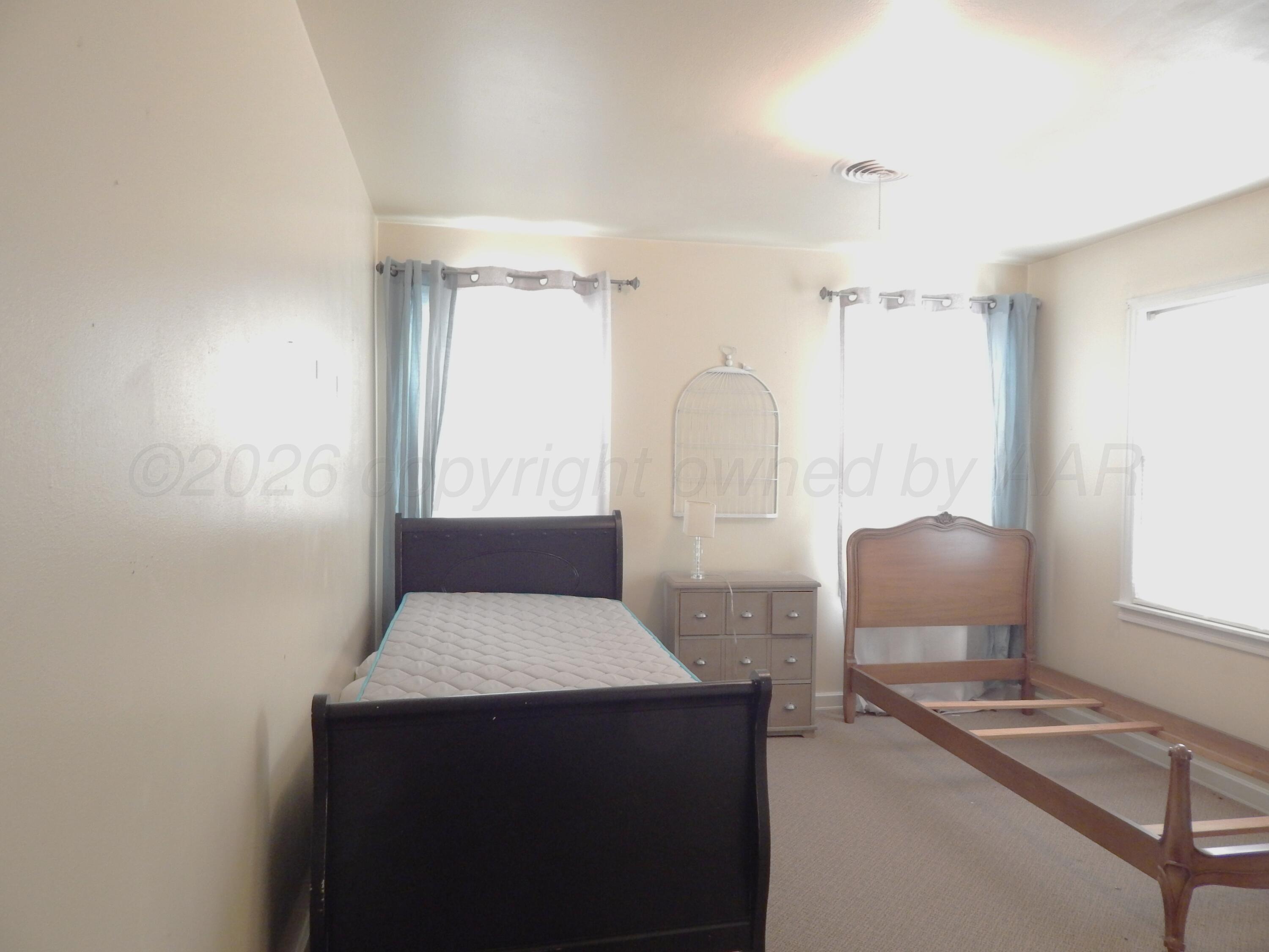 519 Third Street McLean, TX 79057 - Photo 7 of 19 a living room with furniture and a window