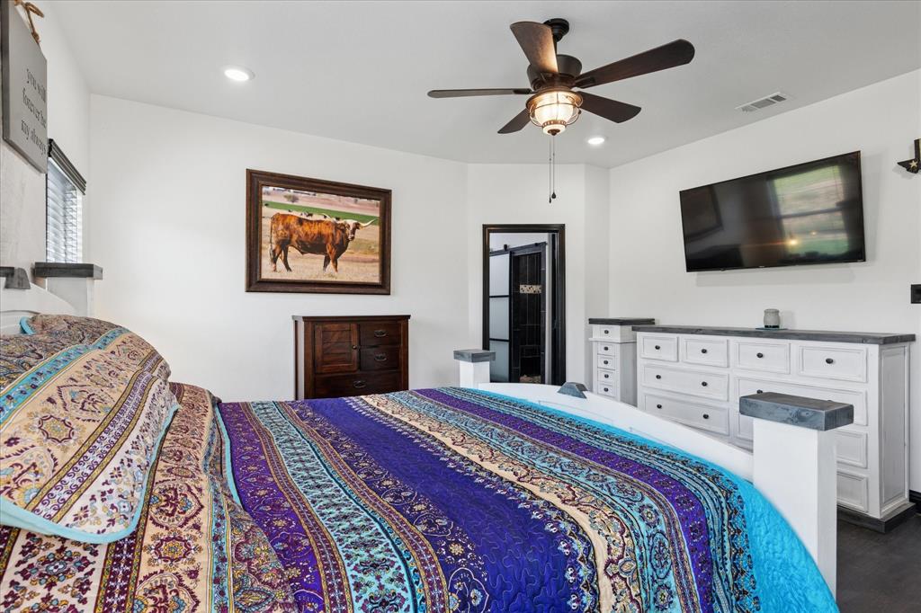 403 Polk Road Bowie, TX 76230 - Photo 14 of 36 Bedroom with recessed lighting, dark wood-type flooring, and ceiling fan