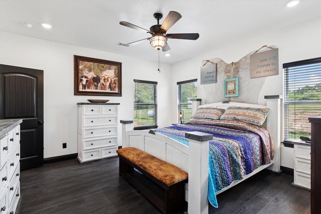 403 Polk Road Bowie, TX 76230 - Photo 15 of 36 Bedroom with dark wood-type flooring, recessed lighting, and a ceiling fan