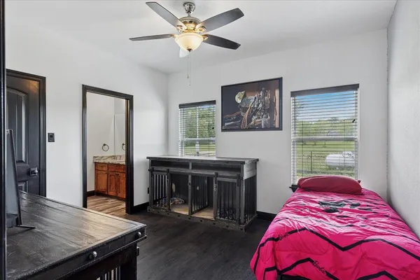 a bed room with a bed and furniture