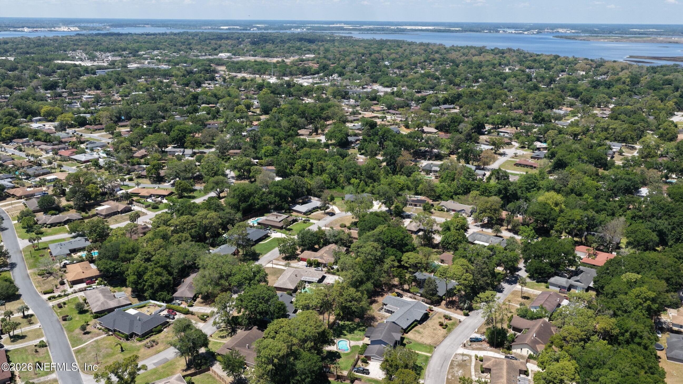 3371 Debussy Road Jacksonville, FL 32277 - Photo 10 of 21 DJI_20260423140130_0013_D