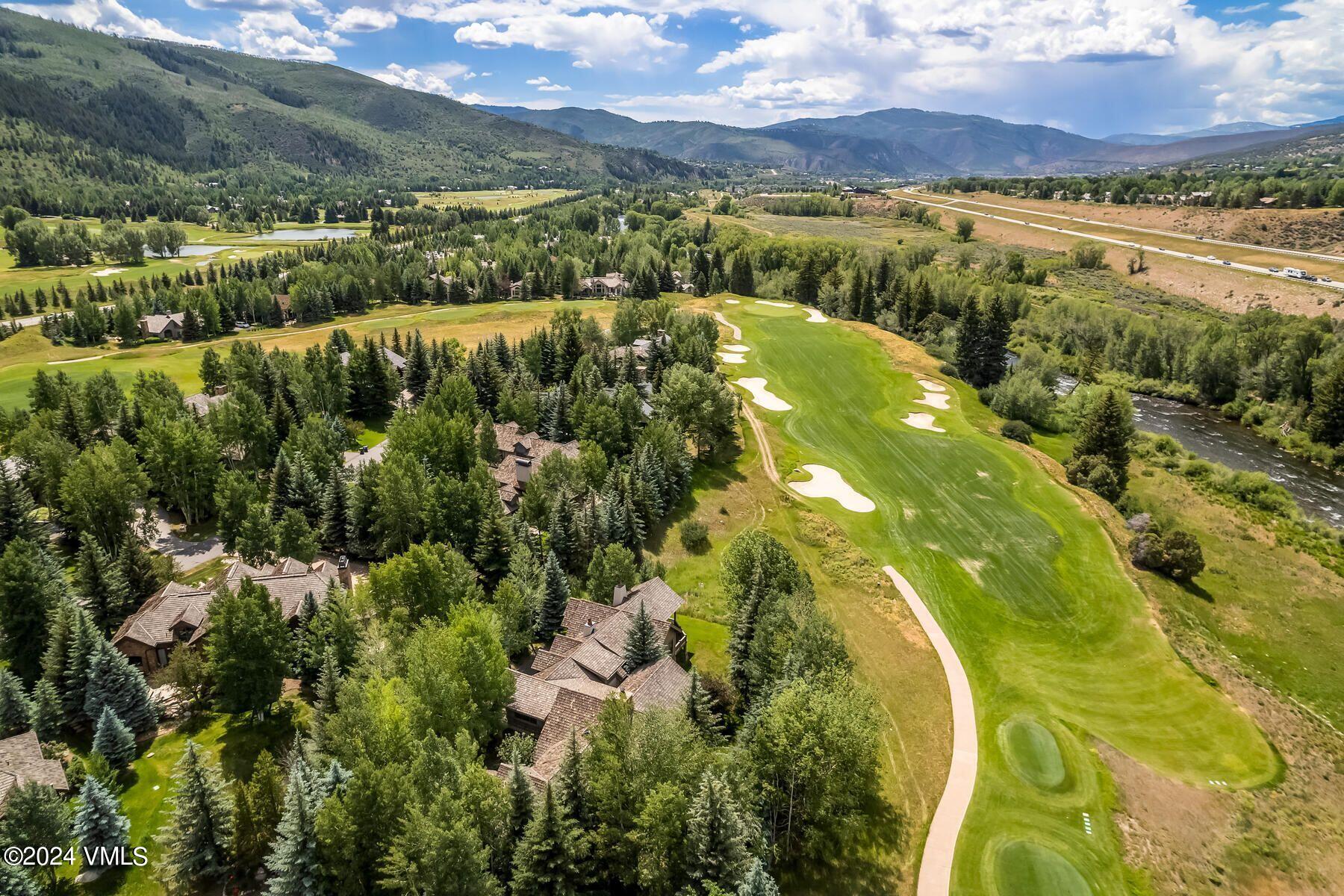 90 Riverbend Court, Unit E Edwards, CO 81632 - Photo 13 of 35 a view of an outdoor space and a lake view