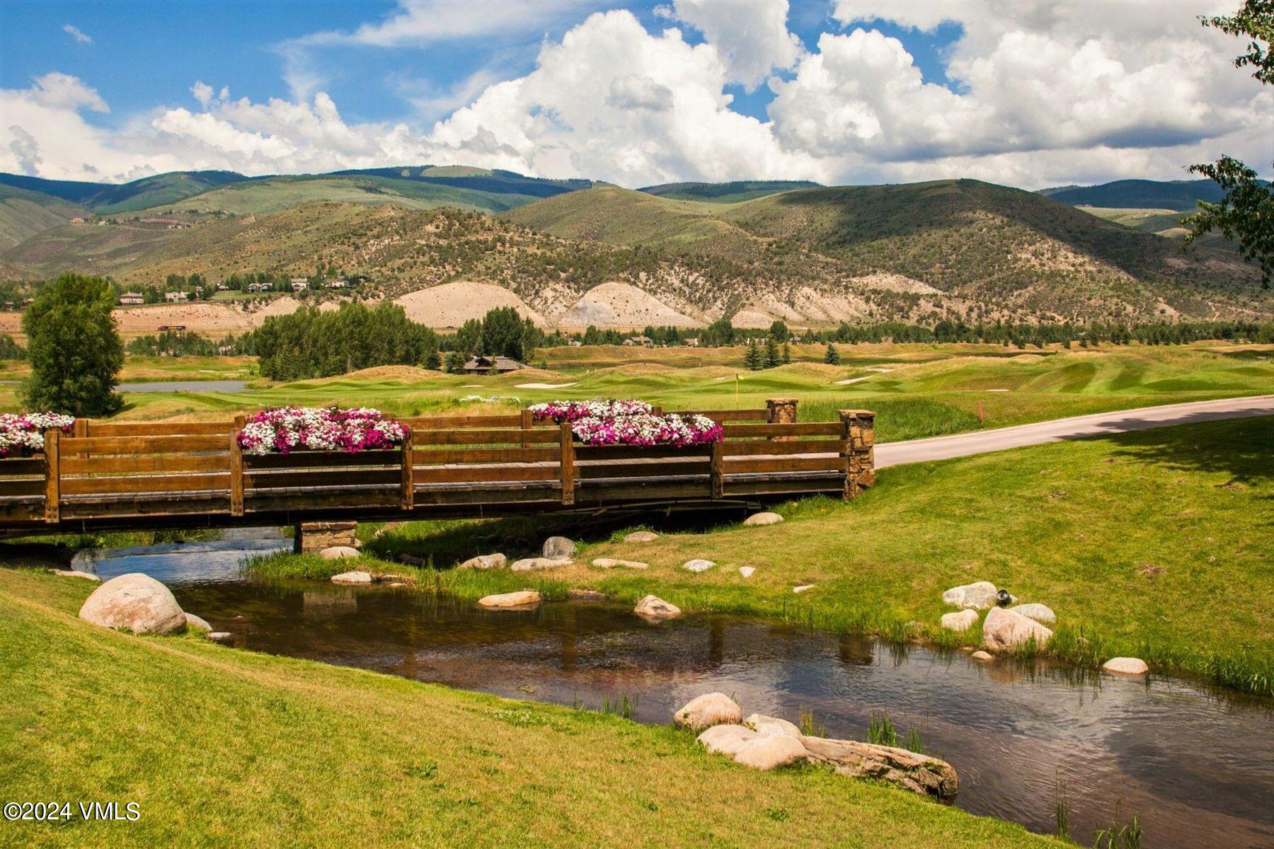 90 Riverbend Court, Unit E Edwards, CO 81632 - Photo 29 of 35 a view of a lake with houses