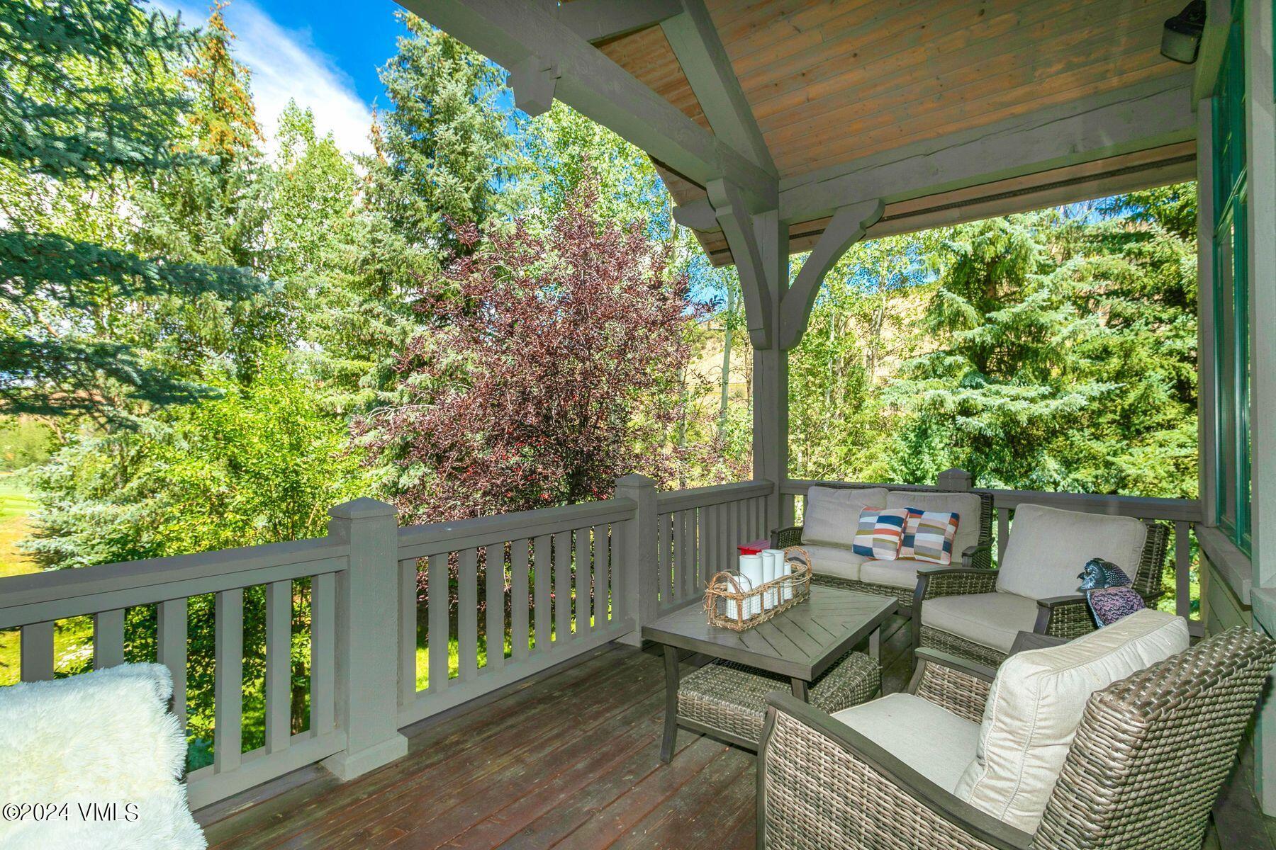 90 Riverbend Court, Unit E Edwards, CO 81632 - Photo 5 of 35 a outdoor living space with furniture and garden view