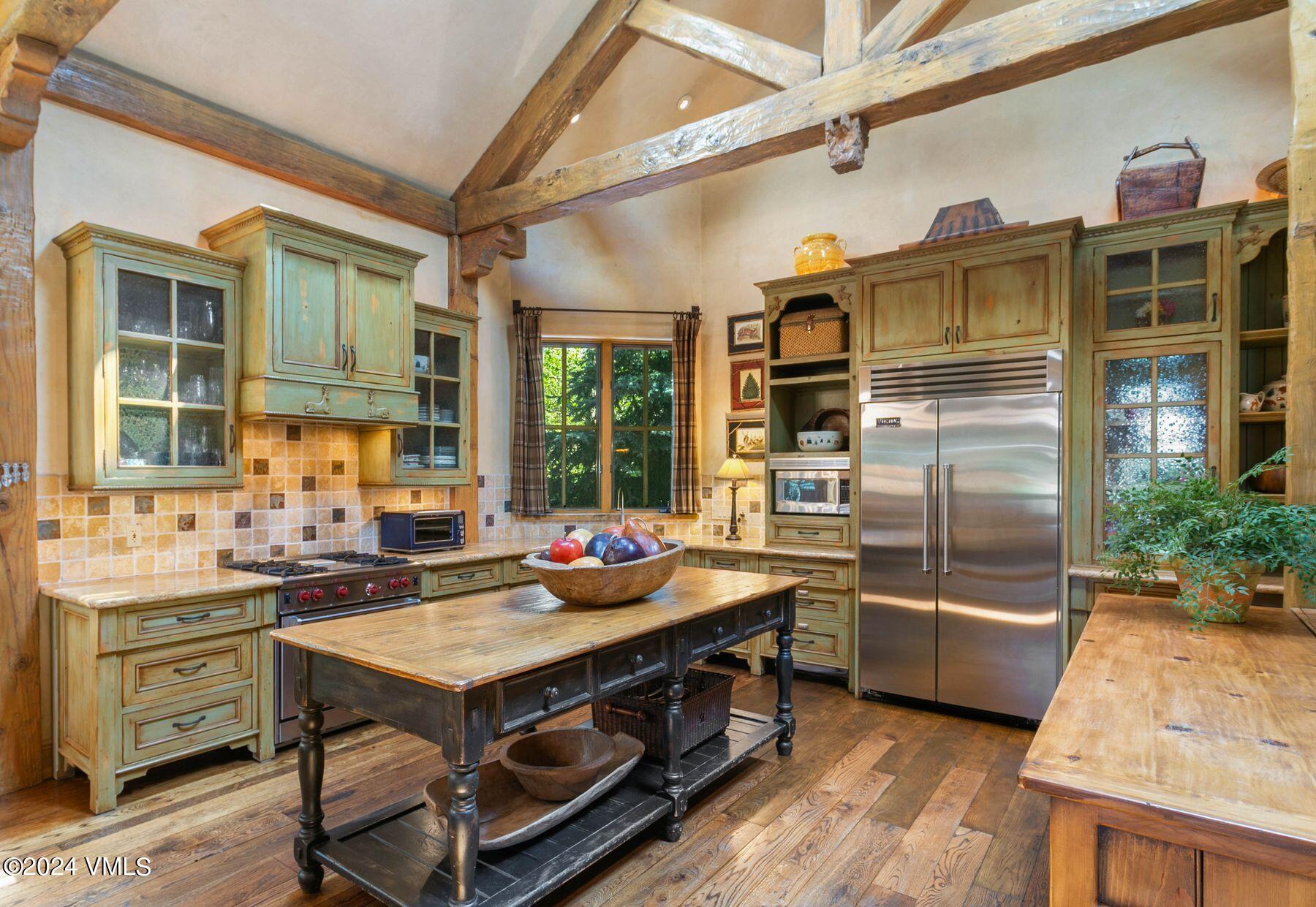 90 Riverbend Court, Unit E Edwards, CO 81632 - Photo 8 of 35 a kitchen with a stove a sink and a refrigerator