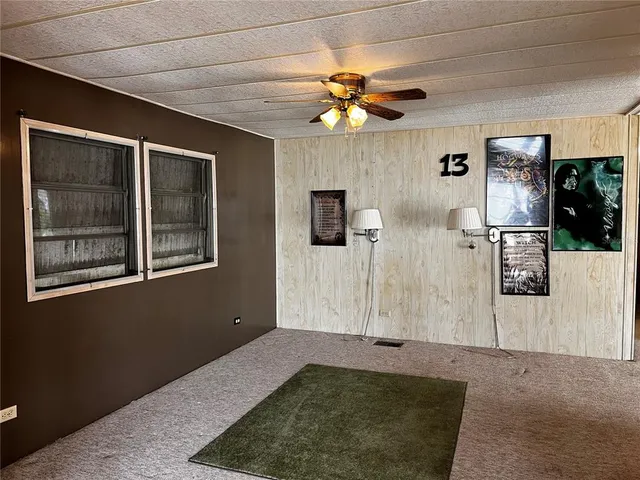 a view of a livingroom with a furniture