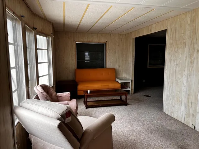 a room with furniture and a window