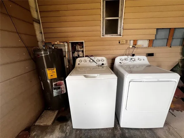 a utility room with dryer and washer