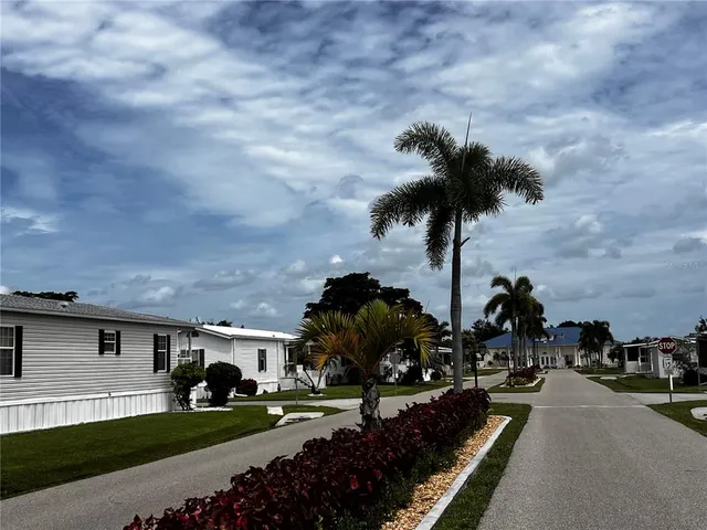 a view of a street with a building in the background