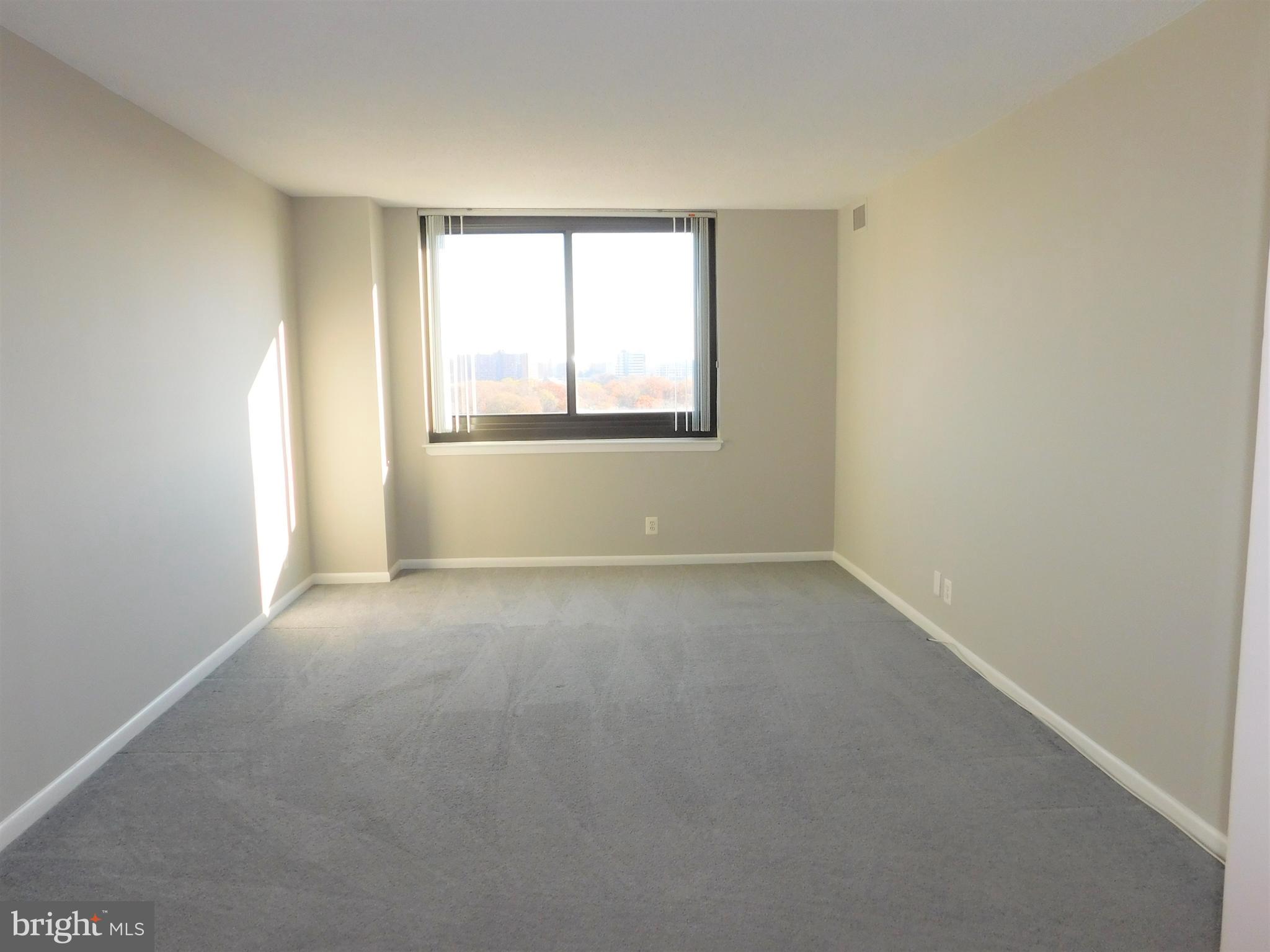 5501 Seminary Road, Unit 1006S Falls Church, VA 22041 - Photo 18 of 31 an empty room with a window