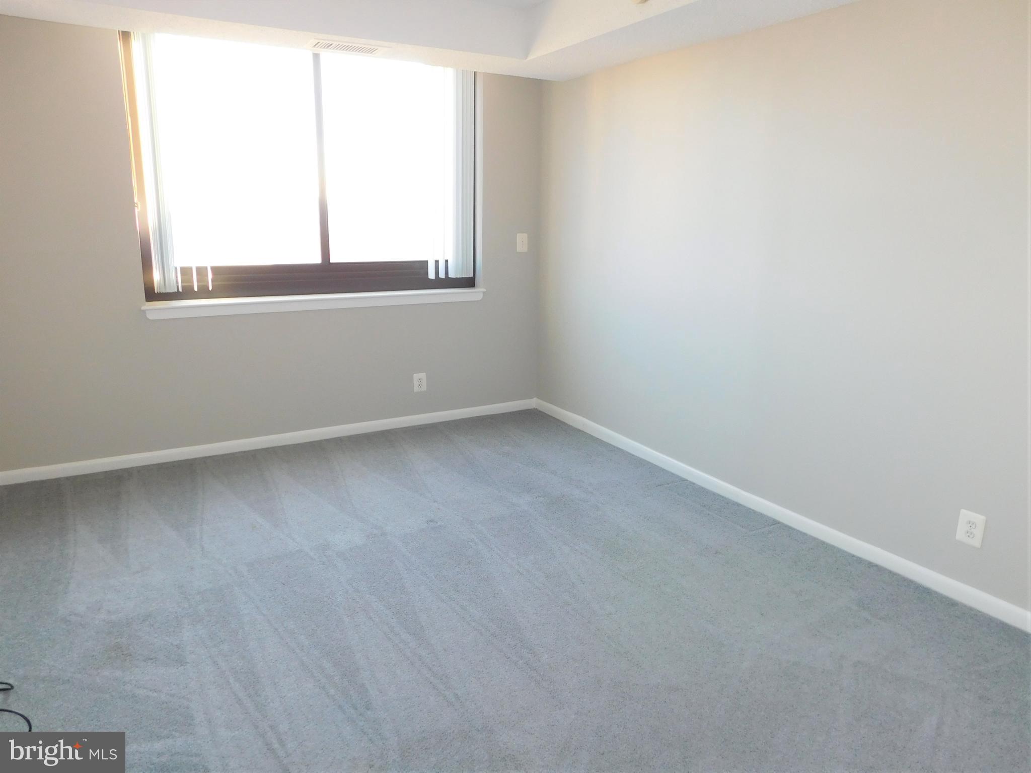 5501 Seminary Road, Unit 1006S Falls Church, VA 22041 - Photo 22 of 31 an empty room with a window