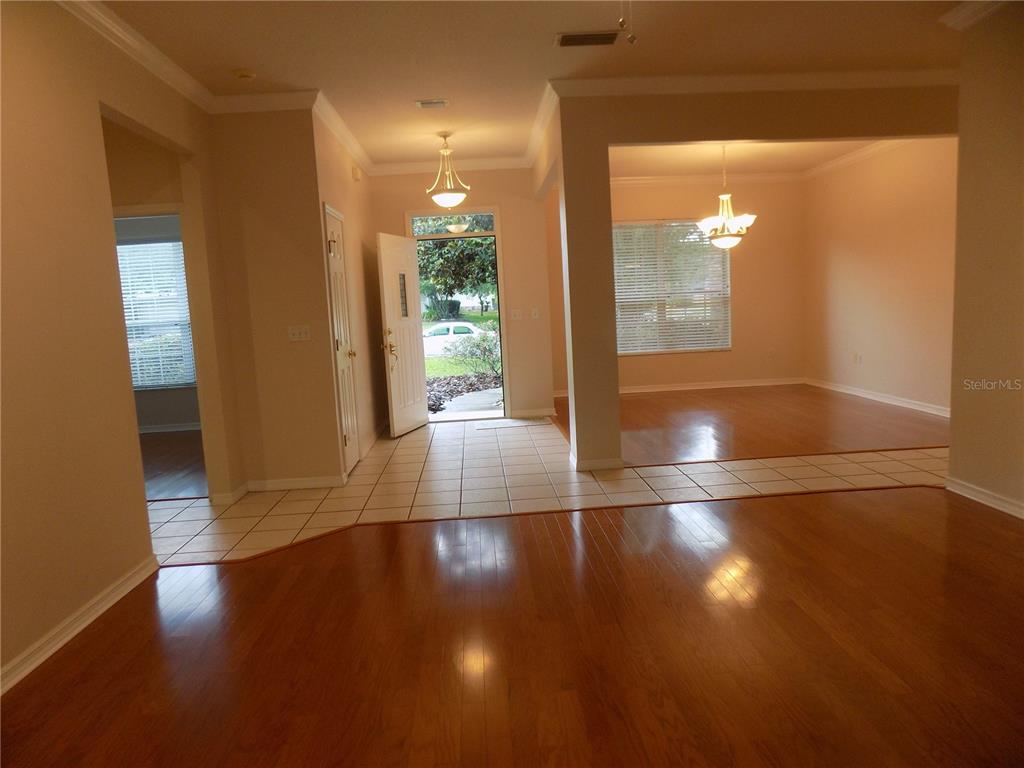 11903 Northwest 9 Road Gainesville, FL 32606 - Photo 5 of 60 a view of a glass door with a glass door