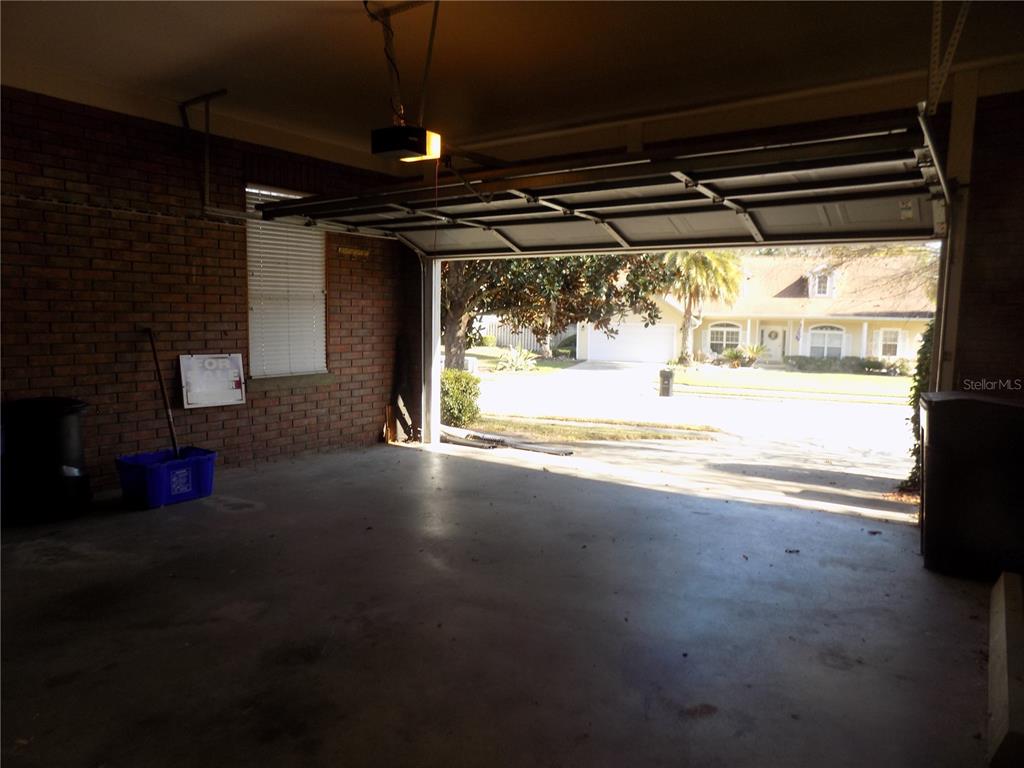 11903 Northwest 9 Road Gainesville, FL 32606 - Photo 51 of 60 a view of empty room with window and a fireplace
