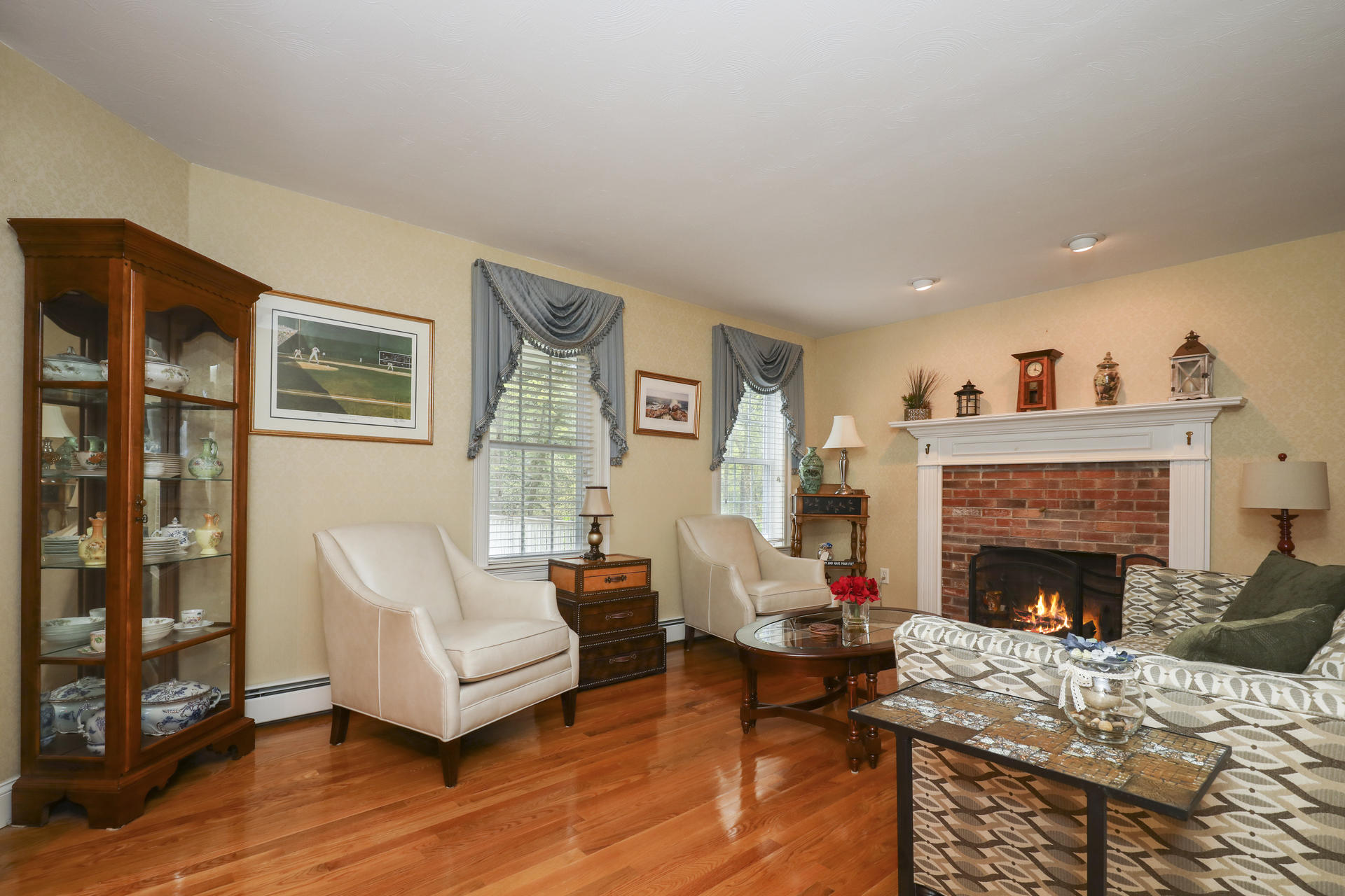 1356 Old Post Road Marstons Mills, MA 02648 - Photo 12 of 53 a living room with furniture and a fireplace