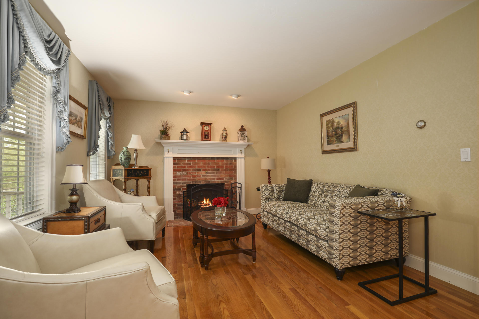 1356 Old Post Road Marstons Mills, MA 02648 - Photo 13 of 53 a living room with furniture and a fireplace