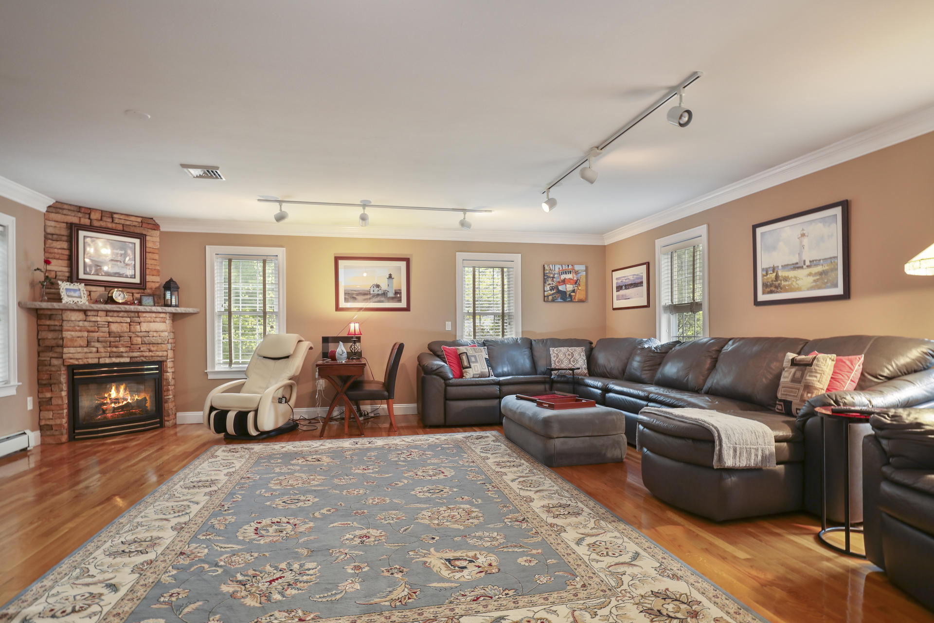 1356 Old Post Road Marstons Mills, MA 02648 - Photo 24 of 53 a living room with furniture and a fireplace