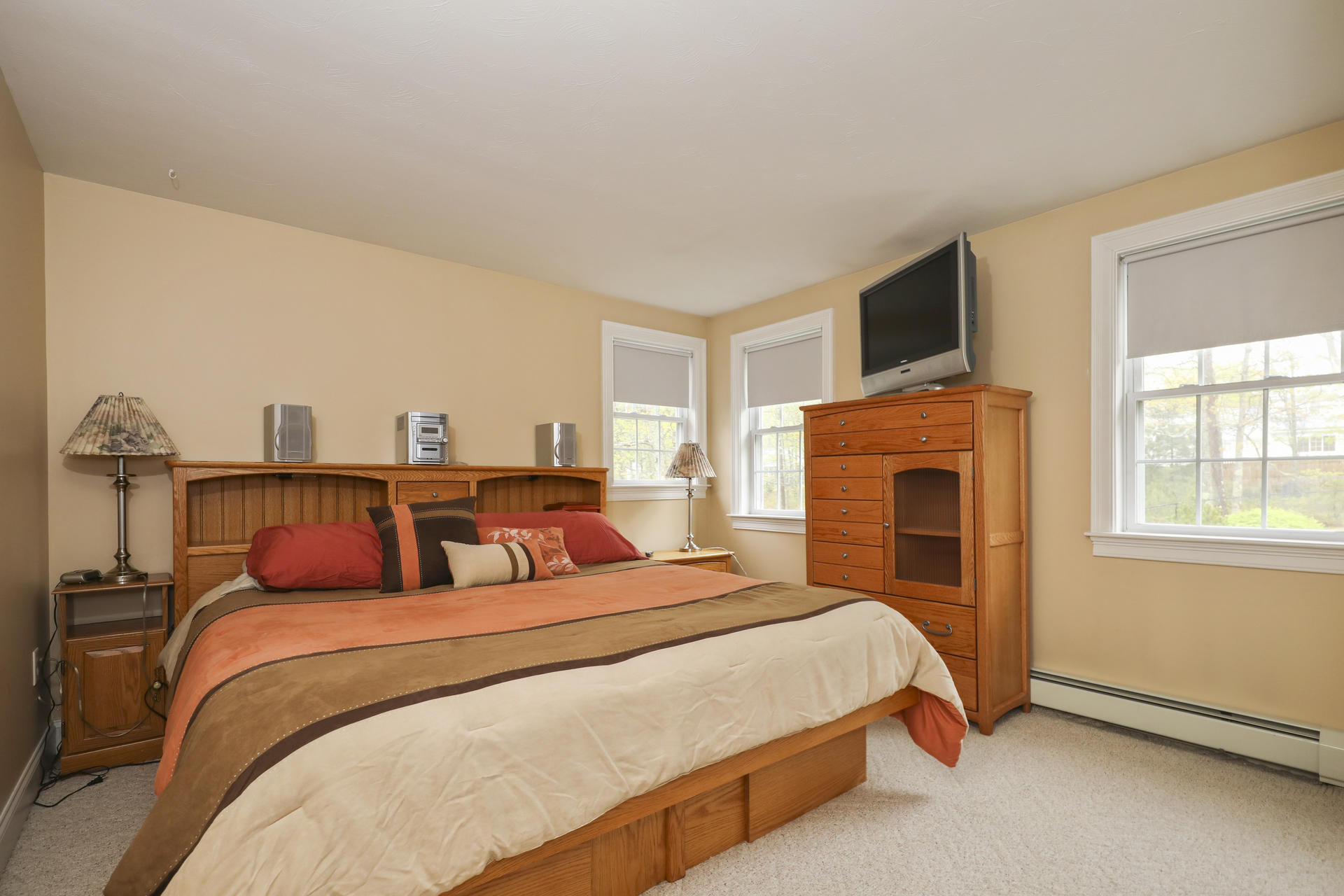1356 Old Post Road Marstons Mills, MA 02648 - Photo 31 of 53 a bedroom with bed and wooden floor