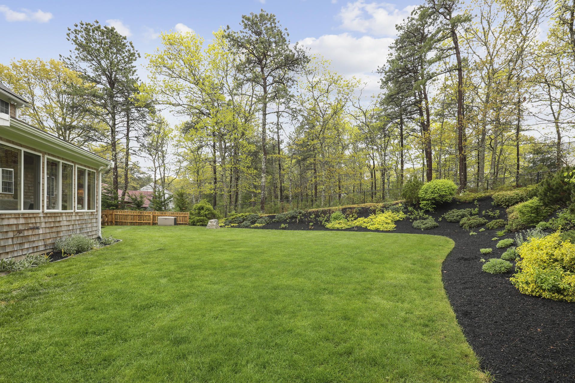 1356 Old Post Road Marstons Mills, MA 02648 - Photo 40 of 53 a view of a backyard with garden