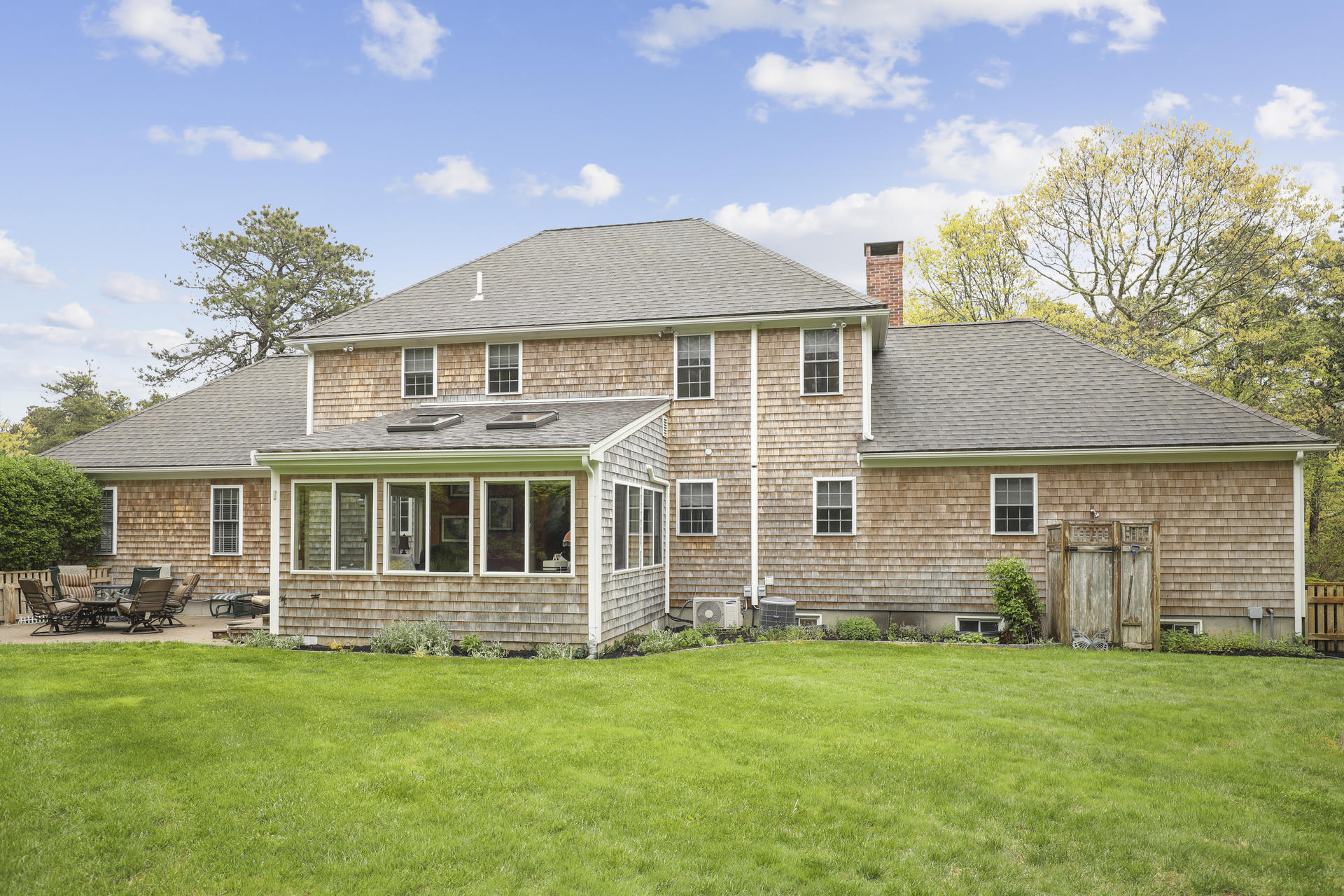 1356 Old Post Road Marstons Mills, MA 02648 - Photo 41 of 53 front view of a house with a garden