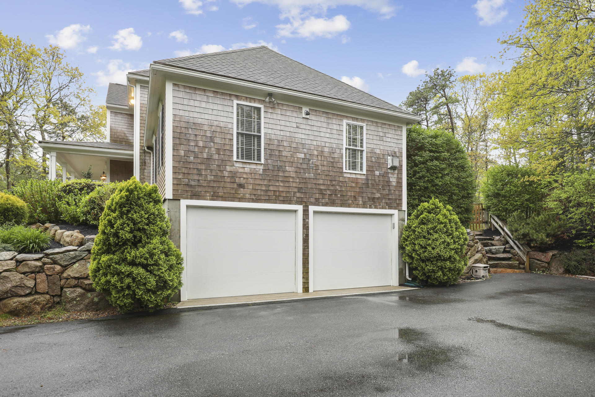 1356 Old Post Road Marstons Mills, MA 02648 - Photo 42 of 53 a front view of a house with a garden