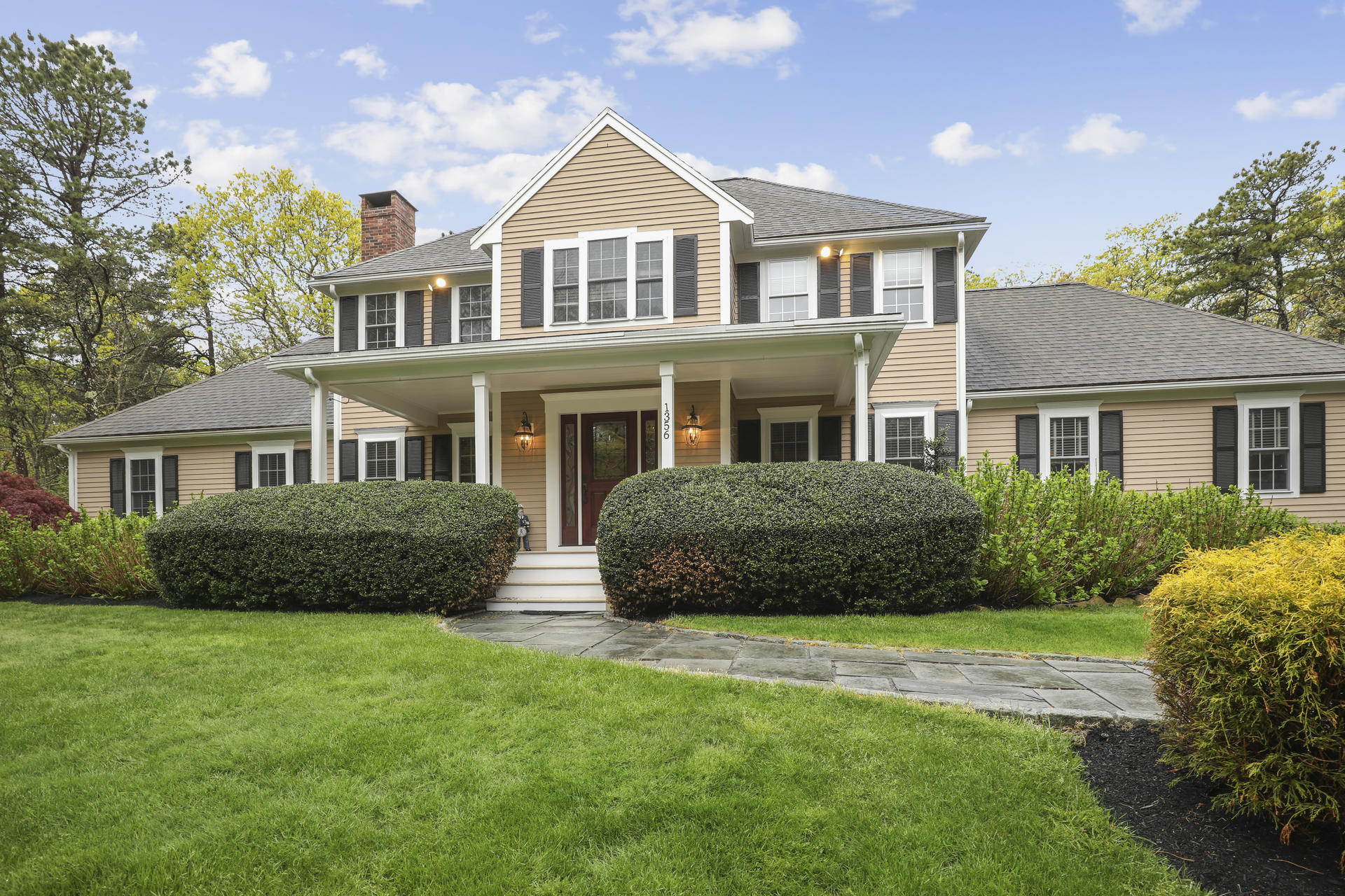 1356 Old Post Road Marstons Mills, MA 02648 - Photo 7 of 53 a front view of a house with a yard