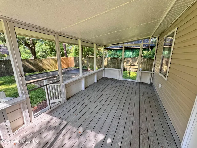 a view of deck with wooden floor and outdoor seating