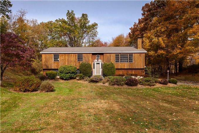 10 Sarah Bishop Road Ridgefield, CT 06877 - Photo 1 of 1 a view of a house with backyard and sitting area