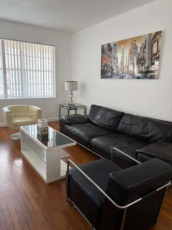 a kitchen with stainless steel appliances granite countertop a sink and a cabinets